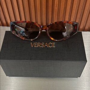 Versace Women's Sunglasses in Tortoise and Black
